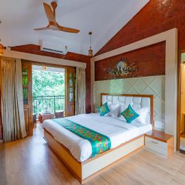 Treebo Green Village Resort with Pool, Goa，位于Maneri的酒店