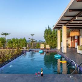 StayVista at Lotus by the lake with Pool, BBQ & Lawn