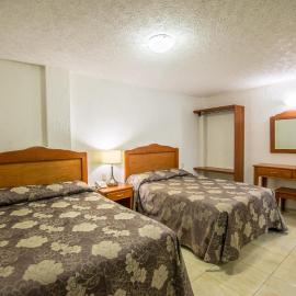 Suites Poliforum Inn