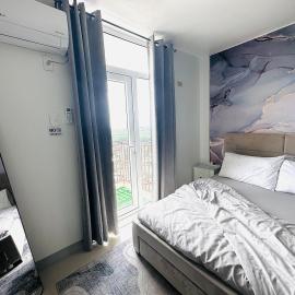 Affordable Condo with Fast Wifi & Near Airport，位于Lo-oc的酒店