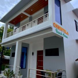 Christela Beach House，位于Pooc的酒店