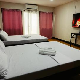 Manalo Resort Hotel，位于Tutulo的酒店