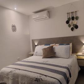 Habitacion confortable centrica en Yumbo cerca al aeropuerto y centro de eventos，位于Yumbo的酒店