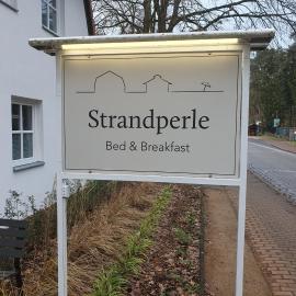Strandperle，位于施维洛塞的酒店