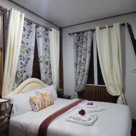 Kwanruean Boutique Hotel,位于Ban Chalon的酒店