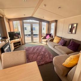 Swift Moselle 2 Bedroom Caravan Located in Uddingston, Glasgow at Maryville Caravan Site，位于阿丁斯顿的酒店