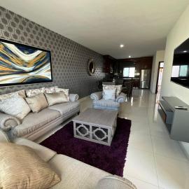 QB Departamento de lujo en Quintas espacioso y confortable，位于库利亚坎的酒店