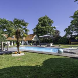 A charming holiday home with a swimming pool
