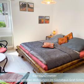 Bambuszimmer mit großem Dachgarten im Gästehaus Graf-Schmelzer，位于特里滕海姆的酒店