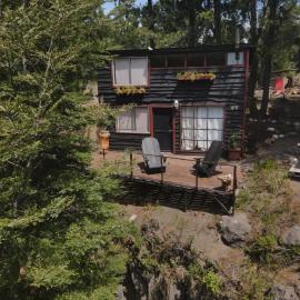 Cabaña con terraza vista al río en Roca Truful，位于梅利佩乌科的酒店