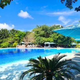 TDJ Japandi Room with Residential Pool access in Tambuli Seaside Mactan，位于Maribago的酒店