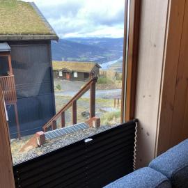 Ski-in & ski-out apartment in Hafjell，位于Øyer的酒店