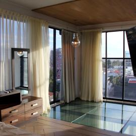 Penthouse with Glass Floor and Volcano View