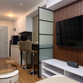 The UrbanNest - 1BR Condo in Marina Spatial, Dumaguete with free fast WiFi and Pool，位于Piapi的酒店