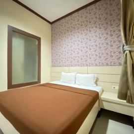 Lily Guest House Syariah RedPartner,位于Bunul的酒店