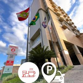 Le Village Flats e Hotel