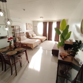 Puerto Princesa Studio Condo with 2 Large Beds, Balcony, Pool & Gym，位于公主港的酒店
