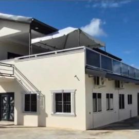 Six bedroom home - 10 minutes away from airport，位于Cunupia的酒店