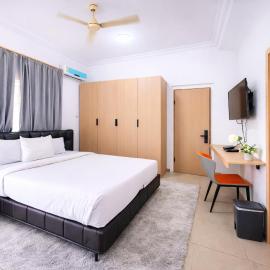 Deluxe Balcony Room in East Legon with Free Breakfast & Gym Access