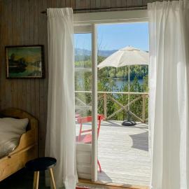 Traditional 60S Cabin By Langåsdammen Lake，位于莱旺厄尔的酒店