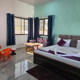 Rainbow Cottage Stays，位于坎哈的酒店