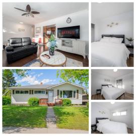 Executive family Relax House New AC 4Bed rooms 4Queen Beds plus Kids play rooms Large Deck Private Backyard 19 minutes YYC 5 minutes Chinook Mall Walk to C Train Free Banff Park，位于卡尔加里的酒店