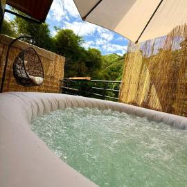 Glamping de lujo en Buga, jacuzzi-Río-Naturaleza-Piscina，位于布加的酒店