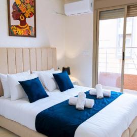 Elegant Apartment with Mountain Views，位于贝尼迈拉勒的酒店