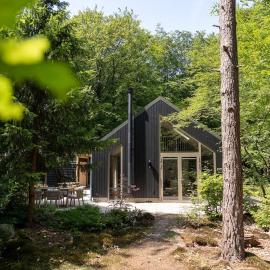 Vakantiehuis Koningsbos I Thuis in het Bos，位于埃姆斯特的酒店