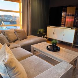Modern and cozy apartment in Heimdal，位于特隆赫姆的酒店