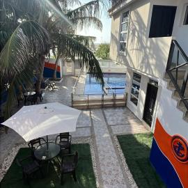 Hotel El Emigrante，位于哥伦比亚港的酒店