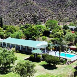 Old Mill Lodge, Seasonal Working Ostrich Farm & Restaurant, Oudtshoorn，位于奥茨胡恩的酒店