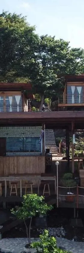 特瓦纳礁石度假屋，位于比拉的酒店