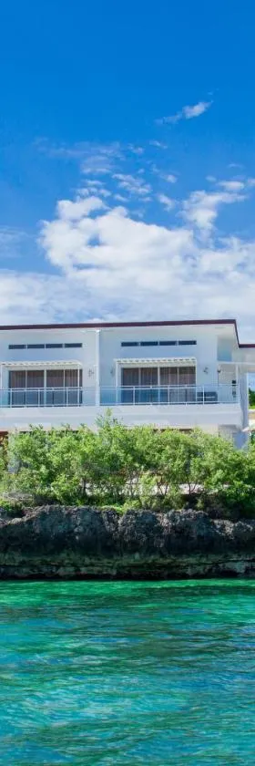 Pearl of Santa Fe - Sabal's Lodge，位于班塔延岛的酒店