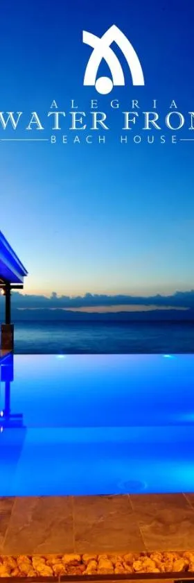Alegria Water Front Beach House，位于Alegria的酒店