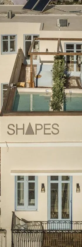 Shapes Luxury Suites，位于埃尔莫波利斯的酒店