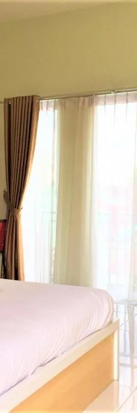 Hotel The Village Syariah，位于北干巴鲁的酒店