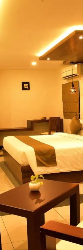 WHITE SUITE HOTEL，位于科泽科德的酒店