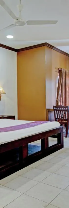 Treebo Premium Travancore Palace Cherthala，位于Alleppey的酒店