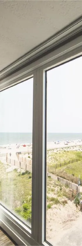 Surf Club Oceanfront Hotel，位于杜威海滩的酒店