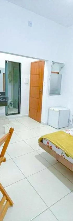 Suíte aconchegante no Centro de Caratinga - kitnet，位于Caratinga的酒店
