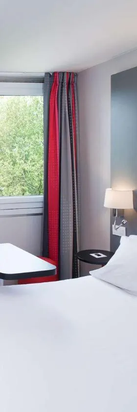 Hôtel Inn Design Paris Saint Quentin，位于蒙蒂尼布勒托讷的酒店