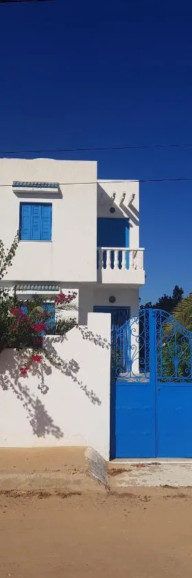 Maison les Palmiers 300m de la plage，位于阿格希尔的酒店