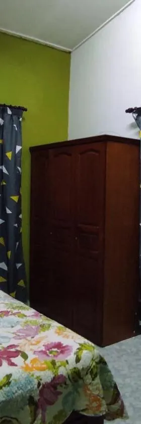 Homestay Opah Parit Buntar, Perak，位于巴力文打的酒店