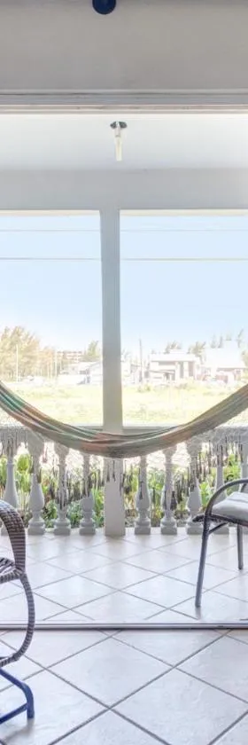 Praia de Itapirubá，位于因比图巴的酒店