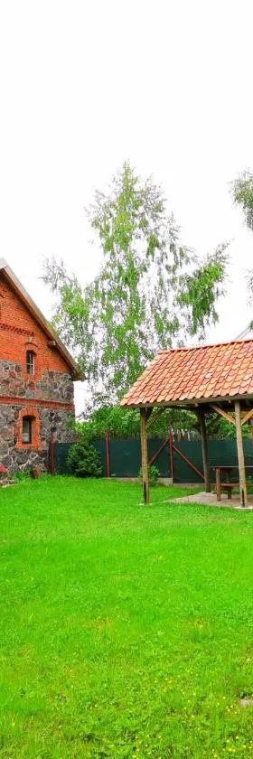 Mazurski Ogród - dom z ogrodem, kominkiem i wiatą biesiadną，位于维德米内的酒店