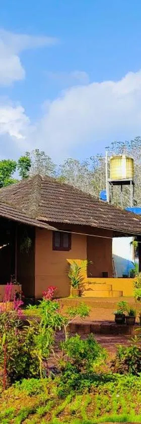 Kudil Mud Cottages, Cheemeni，位于Peringom的酒店