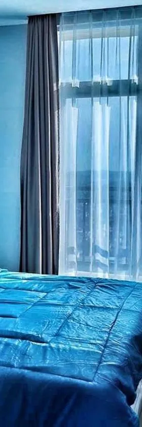 SLEPTOPIA at formosa lvl27 budget unit city and sea view in nagoya jodoh，位于Jodoh的酒店