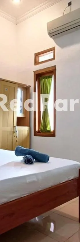 Jogo Segoro Homestay Mitra RedDoorz near Pantai Sundak Gunungkidul，位于Ngandong的酒店