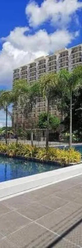 Dracarys 1 Condo complete accomodation Balcony Seaview unli high speed wifi，位于Lo-oc的酒店